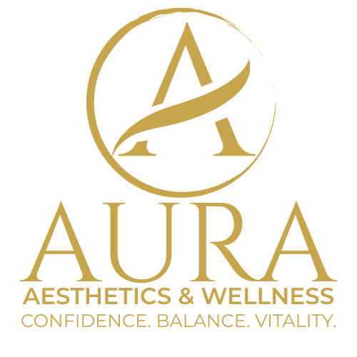 Clean, professional medical spa treatment room with neutral tones at Aura Aesthetics & Wellness in Greenville